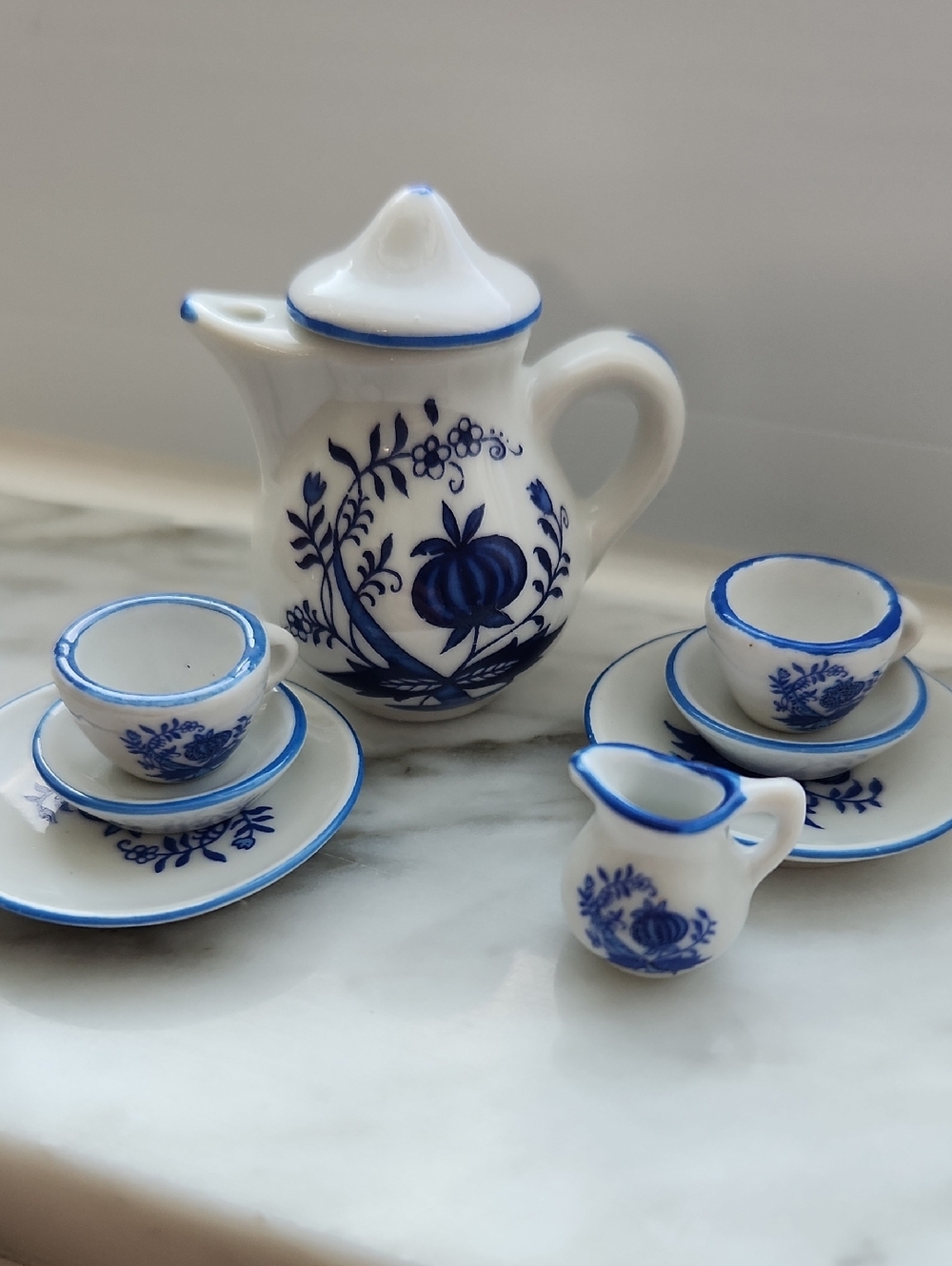 Vintage blue and white "Blue Onion" pattern miniature porcelain tea set